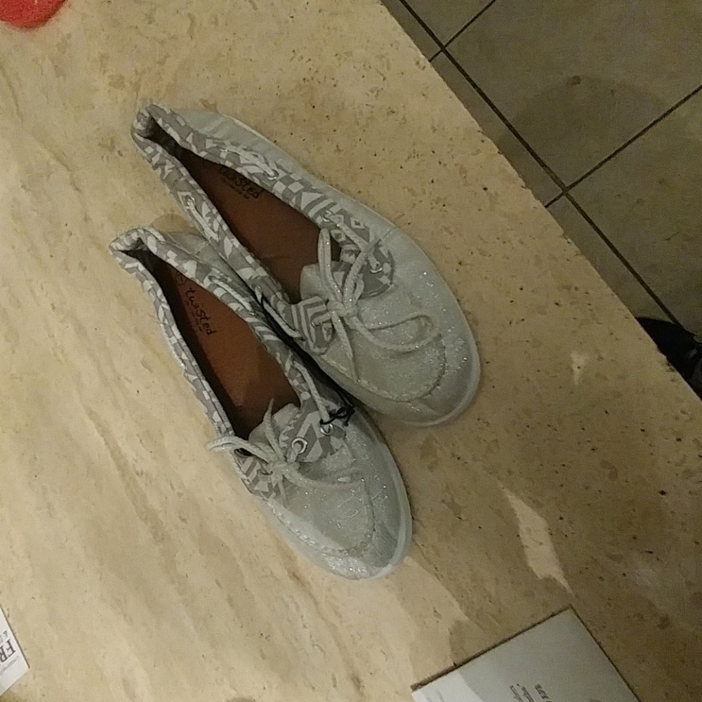 Flat silver slip ons